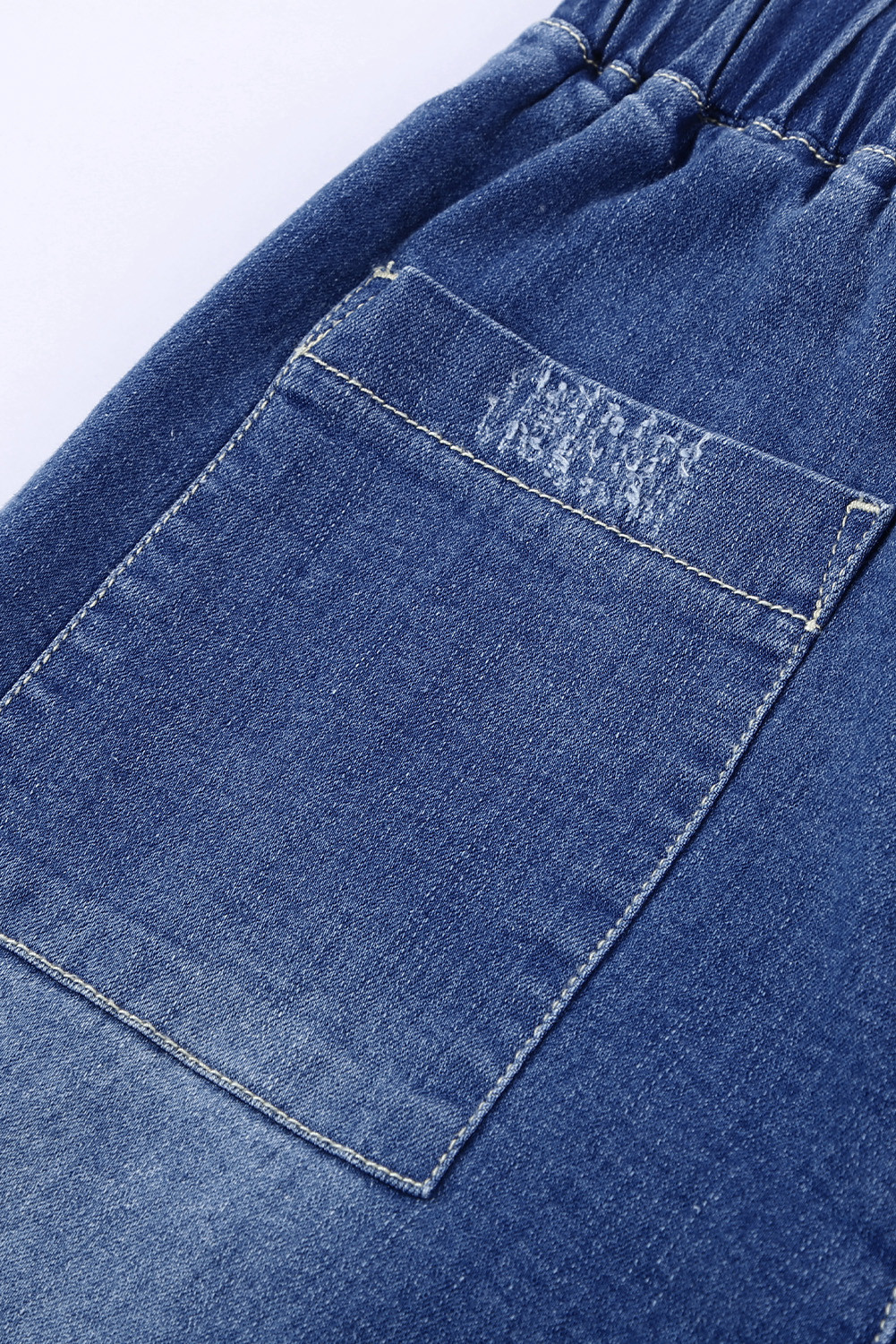 distressed pocketed denim joggers