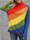 Suéter de punto de ochos con cuello alto y bloques de color arcoíris