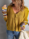 Suéter amarillo de punto con cuello en V y cordones