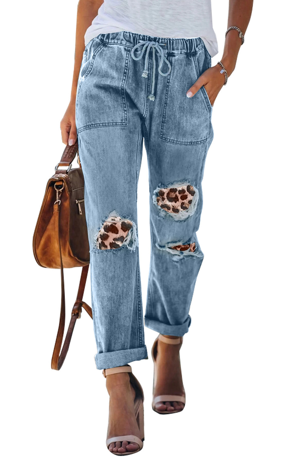 distressed jeans with leopard patches