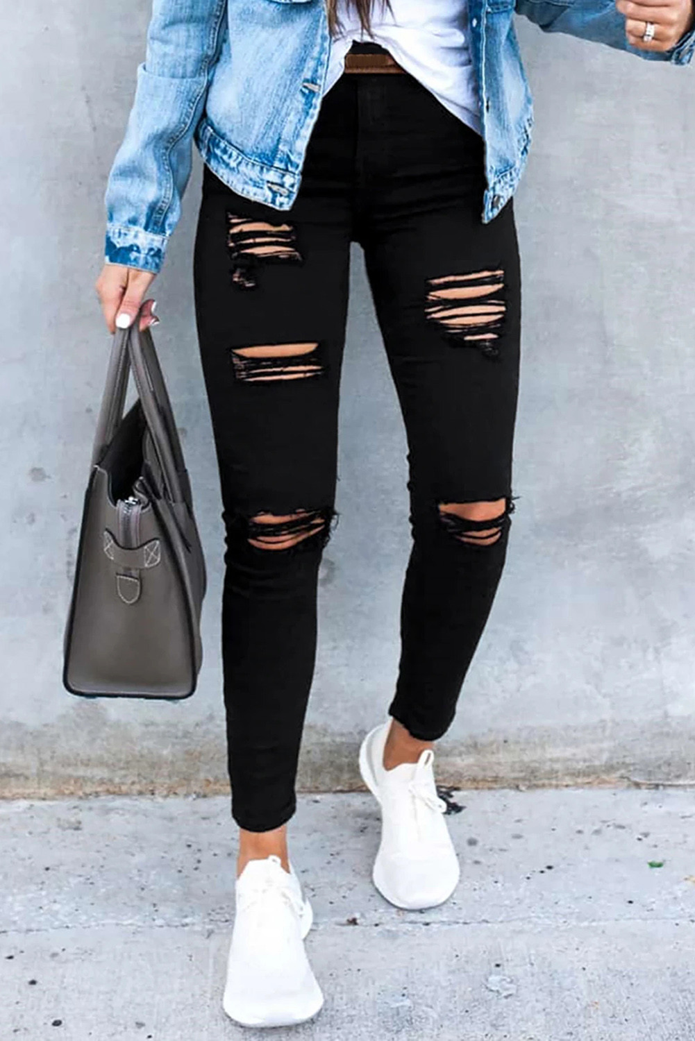 very ripped black jeans