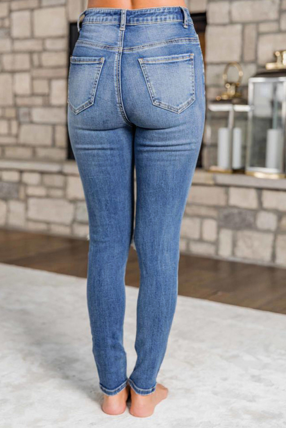 ripped jeans with checkered patches