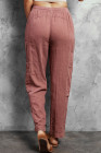 Розовые брюки в стиле милитари с карманами