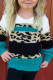 Türkisfarbener Strickpullover mit Leopardenmuster für Mädchen