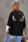 Sudadera negra con estampado de leopardo y costuras en contraste